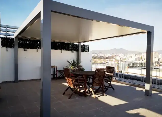 Pergola en aluminium ilotée